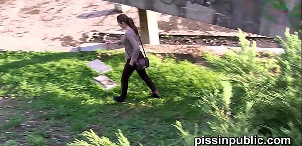  Desperate girls must pee in public park but get caught on camera